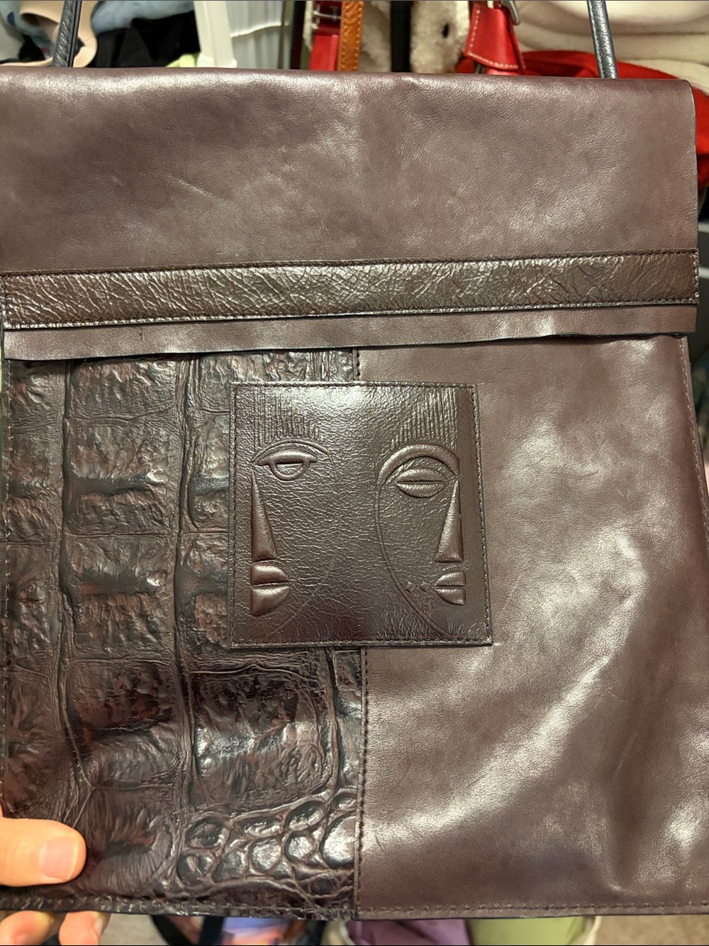 Men's Dark Brown Leather Messenger Bag with Embossed Face Detail